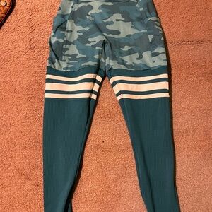 Bombshell Sportswear Green and Cream Leggings with Bold Design